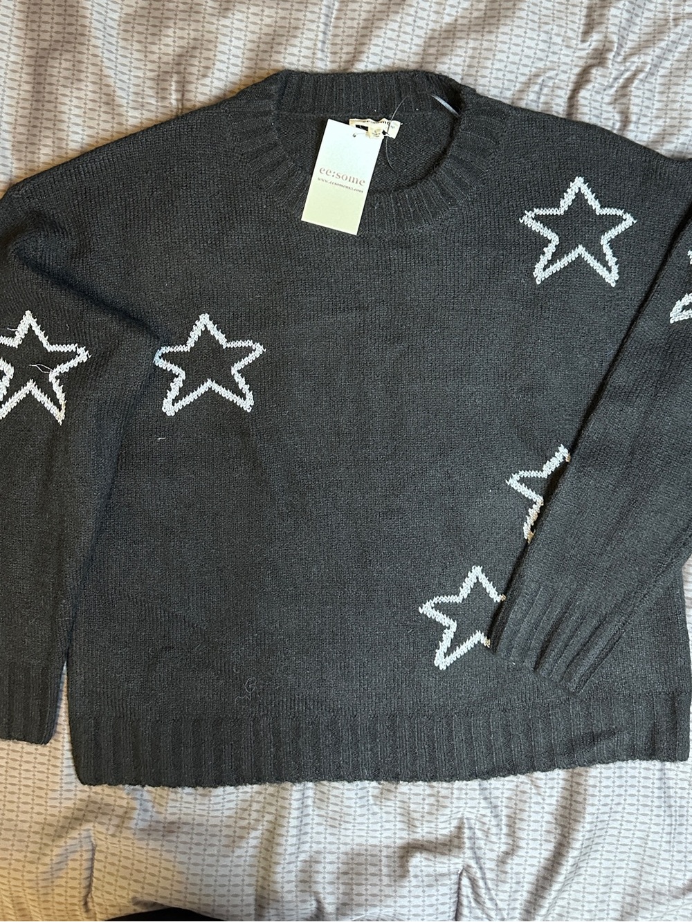 eesome Black Knit Sweater with Silver Star Accents